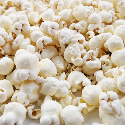 Close-up of specialty air popped garlic parmesan seasoned popcorn from Popped! Republic