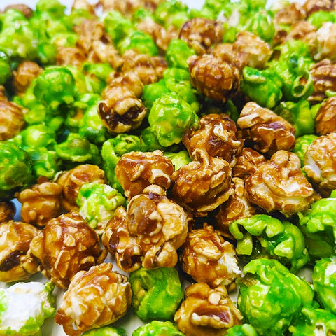 Close-up of green and brown specialty air popped caramel and apple flavored popcorn from Popped! Republic