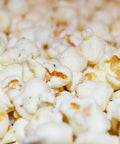 Close-up of savory air popped dill pickle flavored popcorn from Popped! Republic 