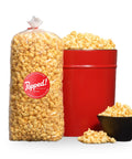 red bucket and an extra large bulk bag of Old Bay seasoned specialty popcorn
