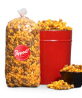Red bucket and an extra large bulk bag of Cheese and Caramel popcorn mix from Popped! Republic