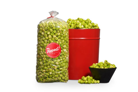 Red bucket and an extra large bulk bag of Gourmet sweet Green Apple popcorn from Popped! Republic