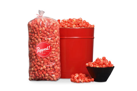 Red bucket and an extra large bulk bag of Gourmet sweet Strawberry popcorn from Popped! Republic