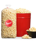 Red bucket and an extra large bulk bag of Gourmet savory white cheddar flavored popcorn from Popped! Republic