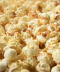 Close-up of gluten-free, air popped wicked white cheddar popcorn from Popped! Republic